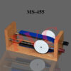 FORCE ON CONDUCTOR This apparatus is useful to demonstrate the force experienced by a current carrying conductor when placed in a magnetic field. Useful apparatus for students to study the Electromangnetic field. Compact, open design. Comprises a polished wooden stand/steam beach stand supporting a strong U-shaped magnet and a pair of brass rails with 4mm socket terminals. A brass axle with plastic discs at its both ends is free to roll along the rails and completes the electrical connection between them. When a current is made to flow through the rails with the axle placed on the rails between the poles of the magnet, the axle is strongly repelled and rolls along the rails, away from the centre of the magnetic field.